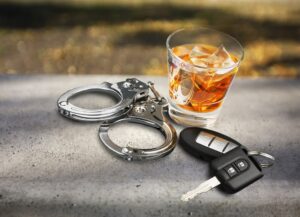 alcohol car keys handcuffs